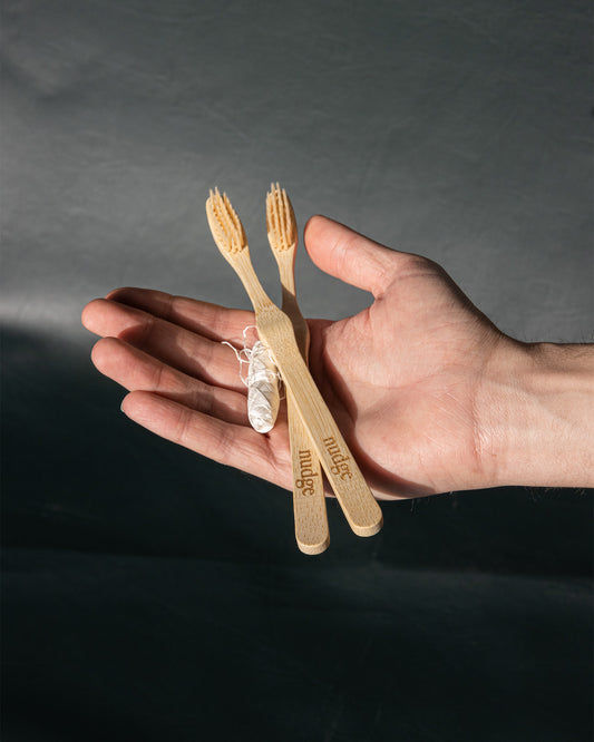bamboo toothbrushes and biodegradable floss
