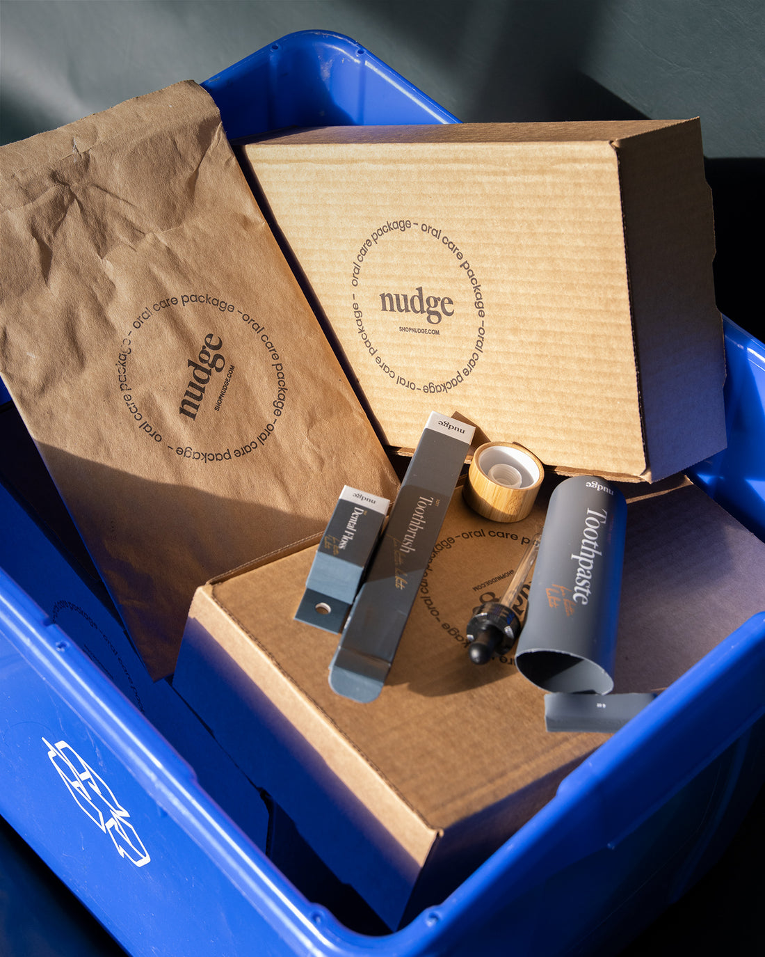 Recyclable boxes with oral care products