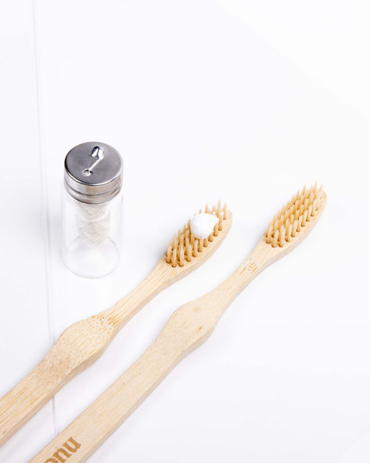 Bamboo toothbrush with natural toothpaste and floss